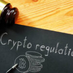 crypto regulation is shown on a business photo using the text