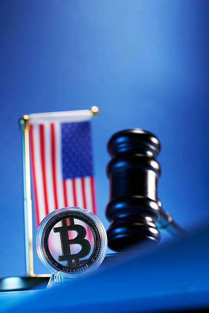 bitcoin american flag and gavel hammer against blue background